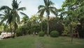 Beautiful tropical garden on site Resort Intime Sanya 5 unfocused stock footage video