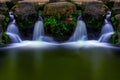 Mirrored tropical garden waterfall Royalty Free Stock Photo