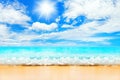 Beautiful tropical island beach panorama, turquoise sea water, ocean wave splash, yellow sand, sun blue sky white clouds, summer Royalty Free Stock Photo