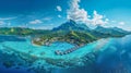 Beautiful tropical island with lush greenery, turquoise waters, overwater bungalows, and stunning mountains in the background Royalty Free Stock Photo