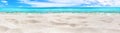 Beautiful tropical island panorama, white sand beach, turquoise sea water, ocean waves, sun blue sky clouds, blurred background Royalty Free Stock Photo