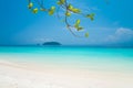 Beautiful tropical island white sand beach blue sky sunny day - Royalty Free Stock Photo