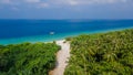 Beautiful tropical landscape with sandy road leading to the beach at the island Manadhoo the capital of Noonu atoll Royalty Free Stock Photo