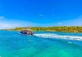 Beautiful tropical natural palm tree boat jetty Contoy island Mexico