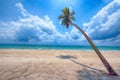 Beautiful tropical ocean and beach, Amazing tropical palm tree leaning over the ocean with blue sky,Thung Wua Laen Beach, Chumphon Royalty Free Stock Photo