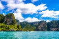 Tropical paradise turquoise water beach and limestone rocks Krabi Thailand