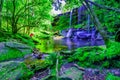 Beautiful tropical rainforest waterfall in deep forest, Phu Kradueng National Park Royalty Free Stock Photo