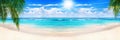 Beautiful tropical sand beach panorama view turquoise sea water ocean wave green palm tree summer holidays exotic island vacation Royalty Free Stock Photo