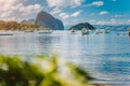 Beautiful tropical scenery. El-Nido, Philippines. Banca boats resting on tranquil early morning at Corong Corong lagoon. Royalty Free Stock Photo