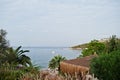 Beautiful tropical sea bay with palms. Scenic landscape with mountain islands and blue lagoon on Aegean sea. Exotic scenery. Royalty Free Stock Photo