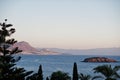 Beautiful tropical sea bay with palms. Scenic landscape with mountain islands and blue lagoon on Aegean sea. Exotic scenery. Royalty Free Stock Photo