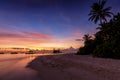 Tropical sunset over a paradise beach in the Maldives islands, Indian Ocean Royalty Free Stock Photo