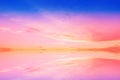 Sky blue  pink cloudy sky sunset yellow light reflection on water wave reflection on horizon boat skyline nature Royalty Free Stock Photo