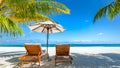 Exotic travel destination, loungers and umbrella under palm leaf. Luxurious tropical beach landscape Royalty Free Stock Photo