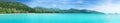 Beautiful tropical Thailand island panoramic with beach, white sea and coconut palms Royalty Free Stock Photo