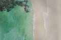 Beautiful tropical white empty beach and sea waves seen from above. Seychelles beach aerial view Royalty Free Stock Photo