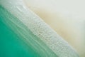 Beautiful tropical white empty beach and sea waves seen from above. Maldives beach aerial view. Top view from drone Royalty Free Stock Photo