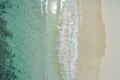 Beautiful tropical white empty beach and sea waves seen from above. Seychelles beach aerial view