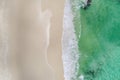 Beautiful tropical white empty beach and sea waves seen from above. Seychelles beach aerial view