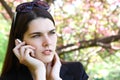 Beautiful troubled girl calling phone outdoor Royalty Free Stock Photo