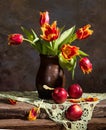 Beautiful tulips and red apples Royalty Free Stock Photo