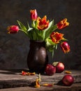 Beautiful tulips and red apples Royalty Free Stock Photo