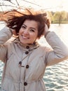 Beautiful Turkish girl smiling near a lake