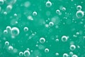 Beautiful turquoise background Rising air bubbles in clear water. Oxygen. Macro Royalty Free Stock Photo