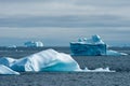 Icebergs in iceberg graveyard in Fjord, Greenland. Different icebergs broken from glaciers in Greenland. Royalty Free Stock Photo