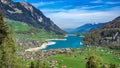 Beautiful Turquoise Lake House Village With Mountain View Royalty Free Stock Photo