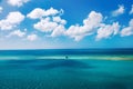 Beautiful turquoise sea perfect blue sky white clouds Royalty Free Stock Photo