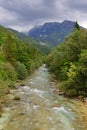 The beautiful turquoise Soca river in the green forest, Bovec, Slovenia, Europe. Royalty Free Stock Photo