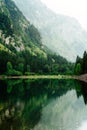 Beautiful turquoise waters of lake and mountains landscape. Royalty Free Stock Photo