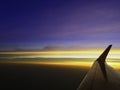 Beautiful twilight cloud sky through airplane wing