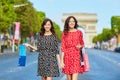 Beautiful twin sisters shopping in Paris Royalty Free Stock Photo