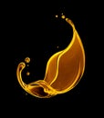 Beautiful twisted splash of oil close up on a black background. Golden thick splashes of juice or olive oil