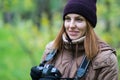 Beautiful twoman tourist travel photographer photographing forest at autumn day