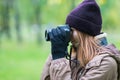 Beautiful twoman tourist travel photographer photographing forest at autumn day