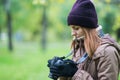 Beautiful twoman tourist travel photographer photographing forest at autumn day