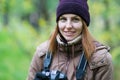 Beautiful twoman tourist travel photographer photographing forest at autumn day