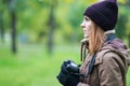 Beautiful twoman tourist travel photographer photographing forest at autumn day