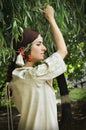 Beautiful Ukrainian girl on the garden
