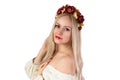 Beautiful ukrainian girl in traditional costume and flower chaplet Royalty Free Stock Photo