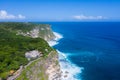 Beautiful uluwatu cliff with blue sea in bali island Royalty Free Stock Photo