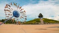 Beautiful umbrella and Tree on small hill Royalty Free Stock Photo