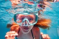 Close portrait of a girl in scuba mask underwater Royalty Free Stock Photo