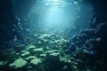 Beautiful underwater view of sunlit rocky bottom and clear blue water Royalty Free Stock Photo