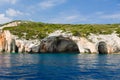 Famous landmark, tourist attraction. Blue Caves in Zakynthos island, Greece. Royalty Free Stock Photo