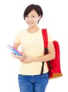 Beautiful university student girl standing and holding book Royalty Free Stock Photo