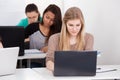 Beautiful University Student With Laptop At Desk Royalty Free Stock Photo